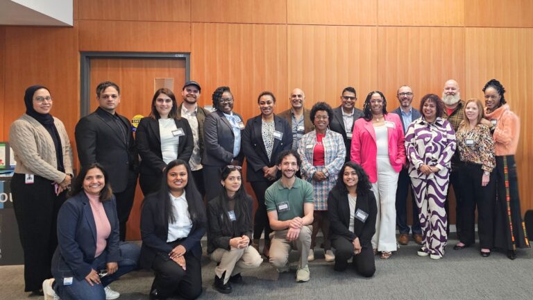 Jennifer Benedict (second from right) stands with members of Rise cohort 3.