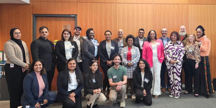 Jennifer Benedict (second from right) stands with members of Rise cohort 3.